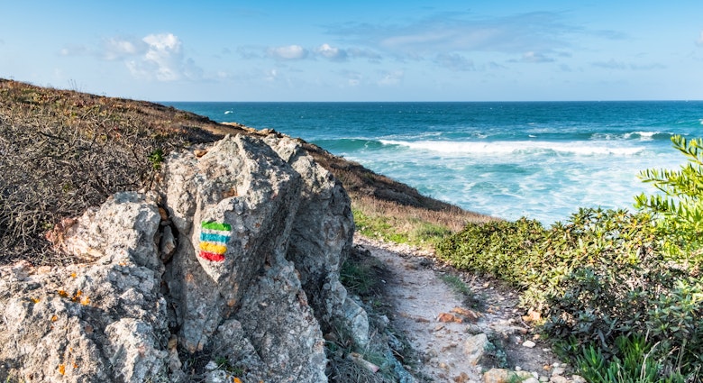 Atlantic ocean coast - Rota Vicentina trekking sign, wild beaches and cliffs in Aljezur, Portugal, License Type: media, Download Time: 2024-09-25T22:24:10.000Z, User: Norma.PrauseBrewer_LonelyPlanet, Editorial: false, purchase_order: 56530, job: Global Publishing WIP, client: Portugal 14, other: Norma Brewer