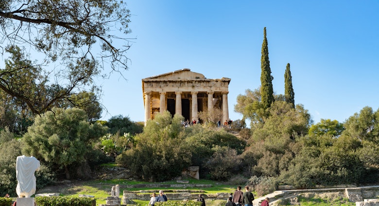 Captured on December 31, 2024, in Athens, Greece. The Ancient Agora, a historic marketplace and political center of classical Athens, with ruins, trees, and visitors exploring the site., License Type: media, Download Time: 2025-04-16T14:10:22.000Z, User: katelyn.perry_lonelyplanet, Editorial: true, purchase_order: 65050 - Digital Destinations and Articles, job: Wip, client: wip, other: Katelyn Perry